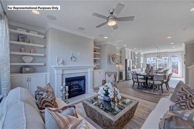 Open concept gathering room adjacent to the kitche