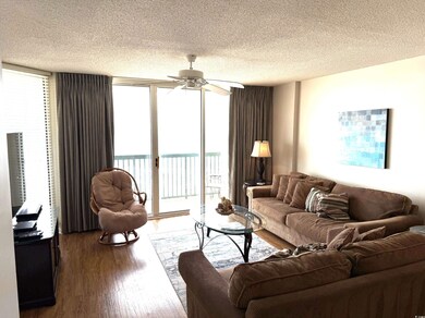 Living area featuring wood finished floors, ceilin