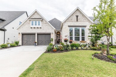 View of front of house featuring a garage and a fr