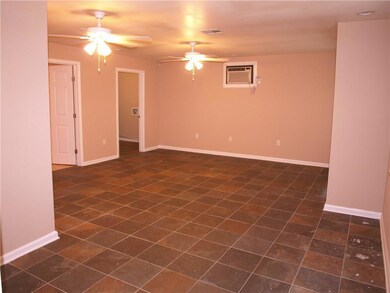 Extra living area with laundry room & bedroom off