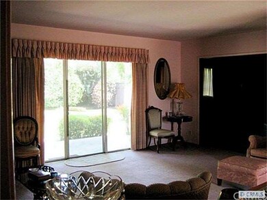 Living room windows to backyard are the first thin