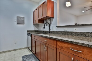 Spicket Commons unit 313, Methuen, MA 01844 - photo 6