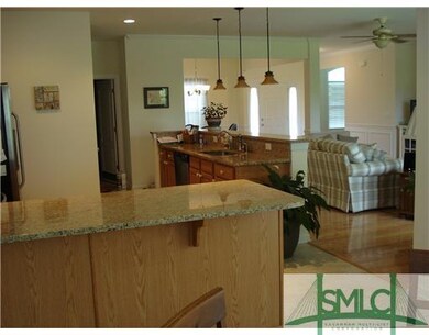 Kitchen. Few walls in this one! See across whole l