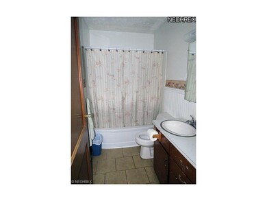 Newly Painted Bathroom with Ceramic Flooring