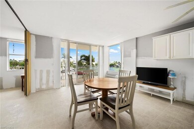 Tiled dining area featuring a wealth of natural li
