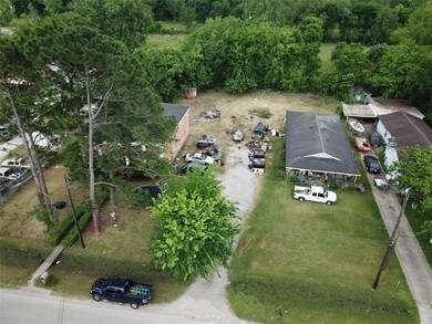 The spacious yard has tall trees to provide plenty of shade!