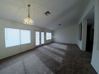Living Room. Vaulted ceilings, new carpet, new bli
