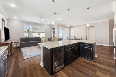 Featuring a built-in wine fridge, the kitchen over