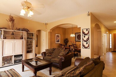 Formal dining with arched entry