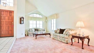 Formal Living Room view with entry into the home