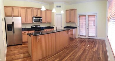 Large kitchen with granite countertops, stainless 