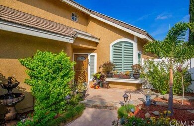Front entrance with fountain and beautiful landsca