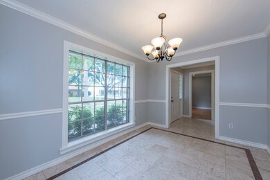 Another view of the formal dining room, looking out the picture window!
