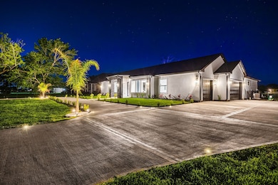 This newly built custom home boasts striking curb