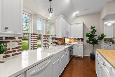 Updated kitchen with hardwood flooring