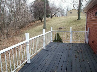 Other. Private rear deck with wooded area behind