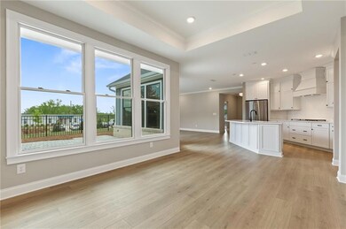 Unfurnished living room with recessed lighting, li