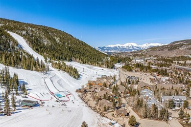 Snowy aerial view with a mountain view