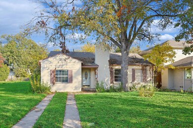 View of front of property with a front lawn