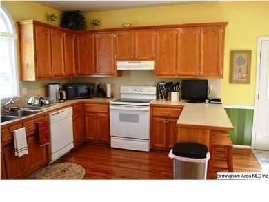 Lots of cabinet and countertop space in this kitch