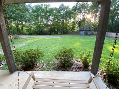 274 Pine Tree porch swing view