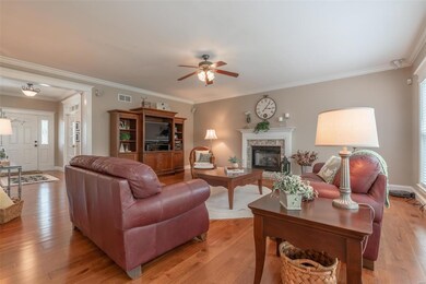 Hearth room with fireplace and beautiful hickory f