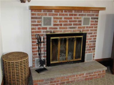 Living Room Woodburning Fireplace ready for cold n