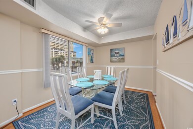 Dining space with hardwood / wood-style floors, a 