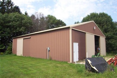 40' x 54' x 12' pole shed with part concrete floor