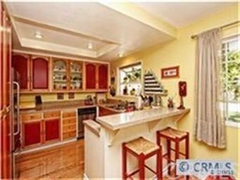 Kitchen with garden window. Views of back yard