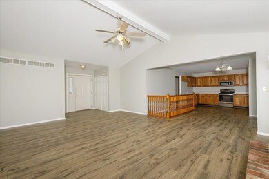 New flooring in Kitchen, Hall and Family room.