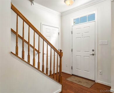 Foyer view to the stairway to the 2nd level, the e