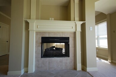 Close up of the see through fire place between family room and kitchen.