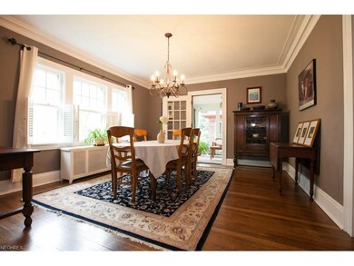 Wonderful dining room with crown moldings, hard wo