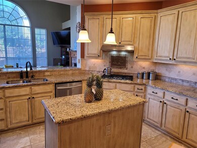 View of updated kitchen overlooking living room la