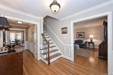 Spacious foyer leads to double wide entry way