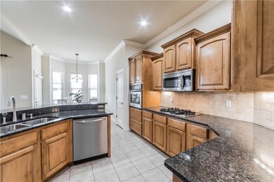 Large kitchen...tons of storage and brand new granite counters