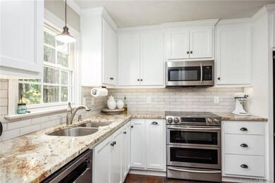 Renovated Kitchen with granite, stainless and electric cooking.