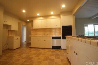 Kitchen has recessed lighting, new flooring and pl