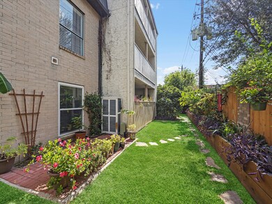 Cozy additional patio area with brick pavers, surr