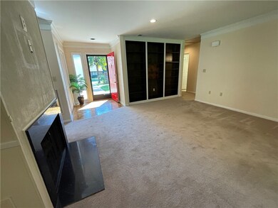Living Room features a Wall of Book Shelves