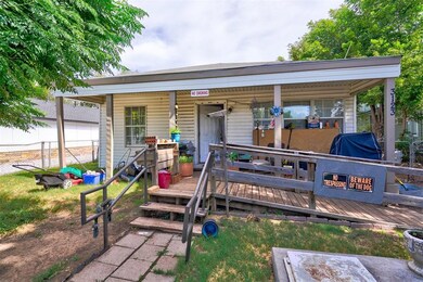 View of front of property featuring a deck