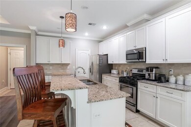 Granite throughout home, kitchen has Frigidaire ap