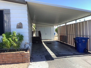 Carport entrance to shed