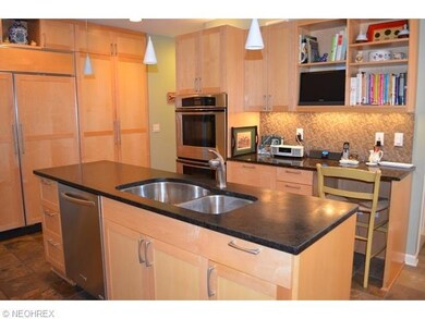 Center island, desk are and top of the line applia