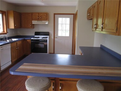 Large kitchen with breakfast bar