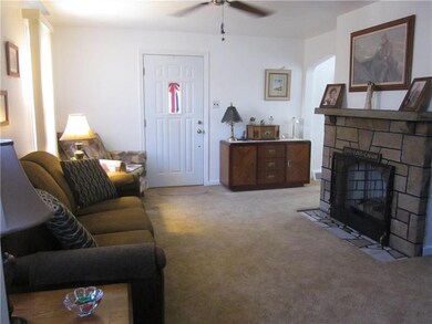 Updated carpeting, window treatements, stone firep