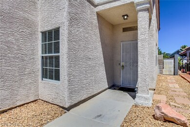 Paver path leads to the side yard