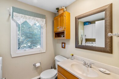 First floor powder room with laundry