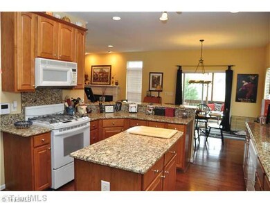 Kitchen. Spacious kitchen with gas cooktop, pantry and granite counters and back splash!